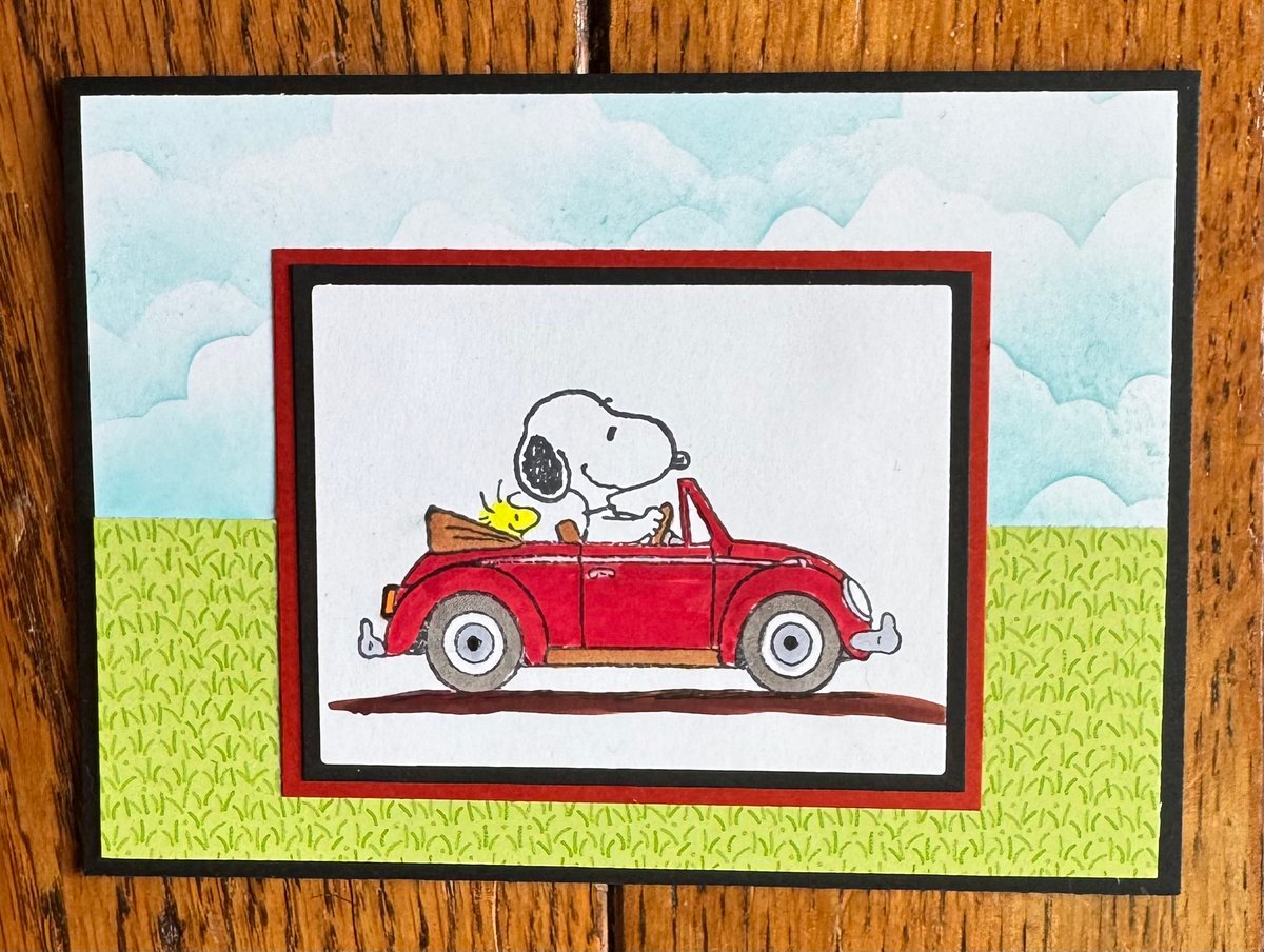 Snoopy in a car